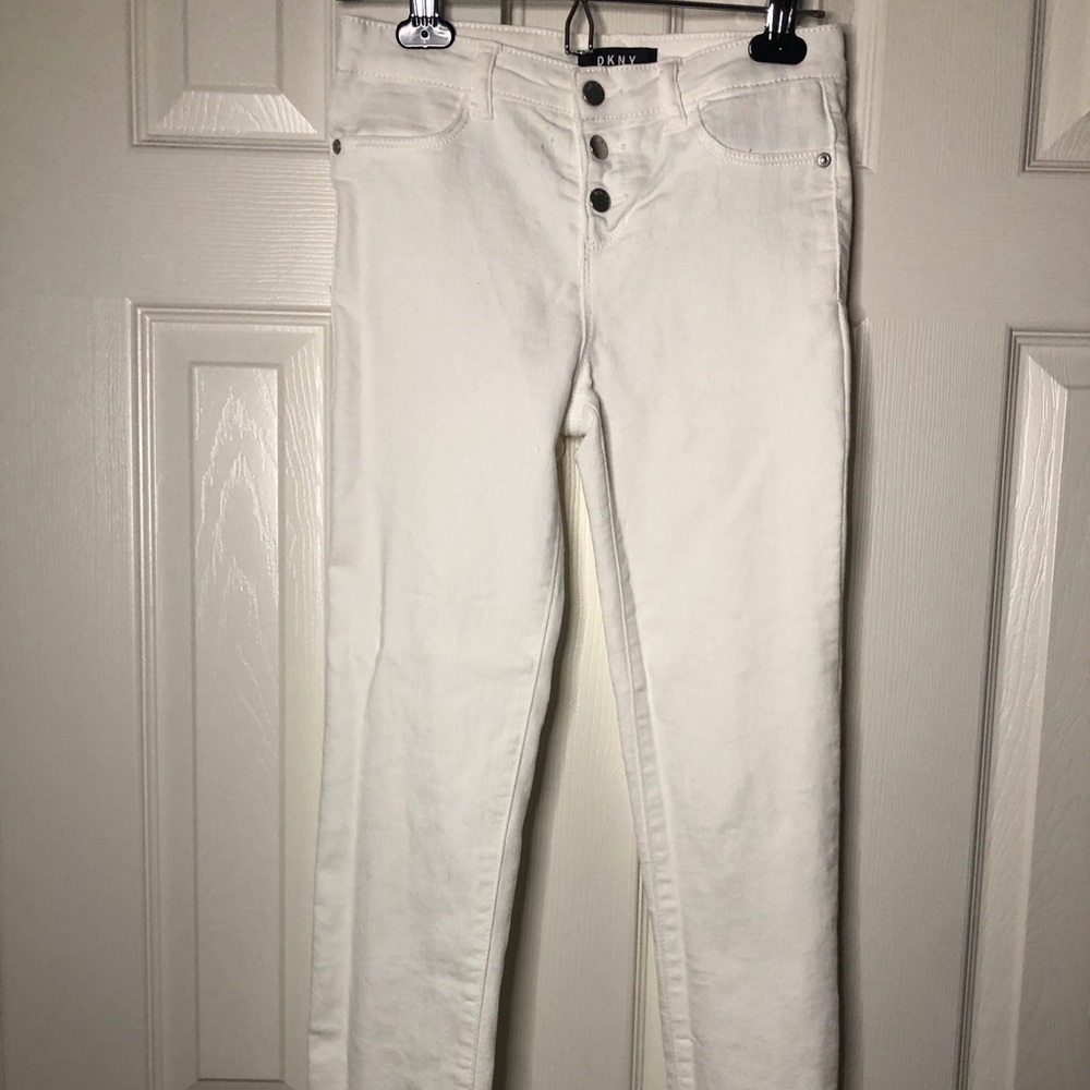 DKNY!!! Big girls jeans. Pure White. Perfect shape. Size (14). Amazing Jeans!!